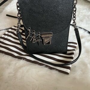 Henri Bendel Peru bag with charms